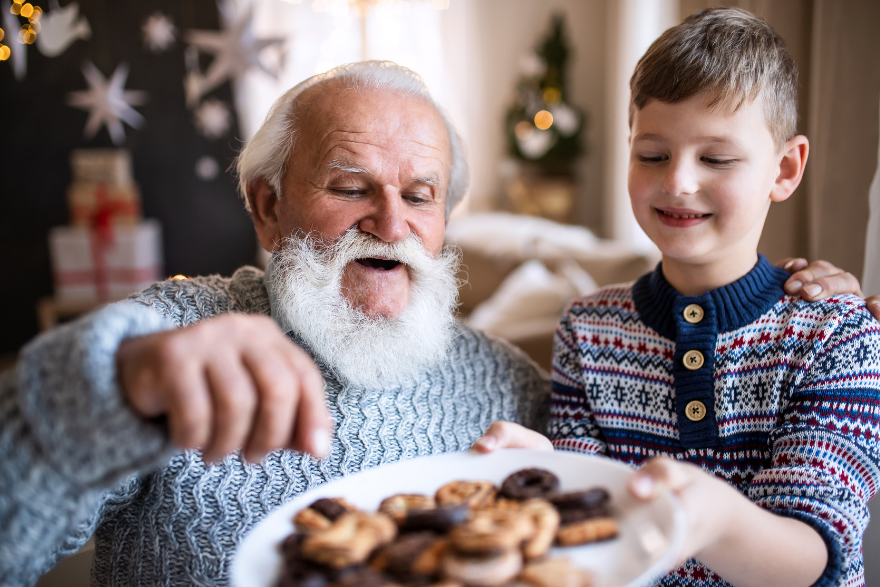 Santa Grandpa eating Christmas Cookies